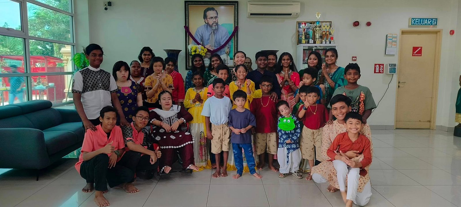 Children and caregivers spending time together at the home